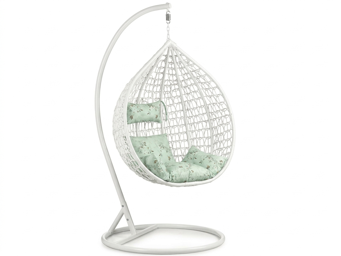 Bílé závěsné křeslo KOKON se stojanem, světle zelený polštář se vzorem