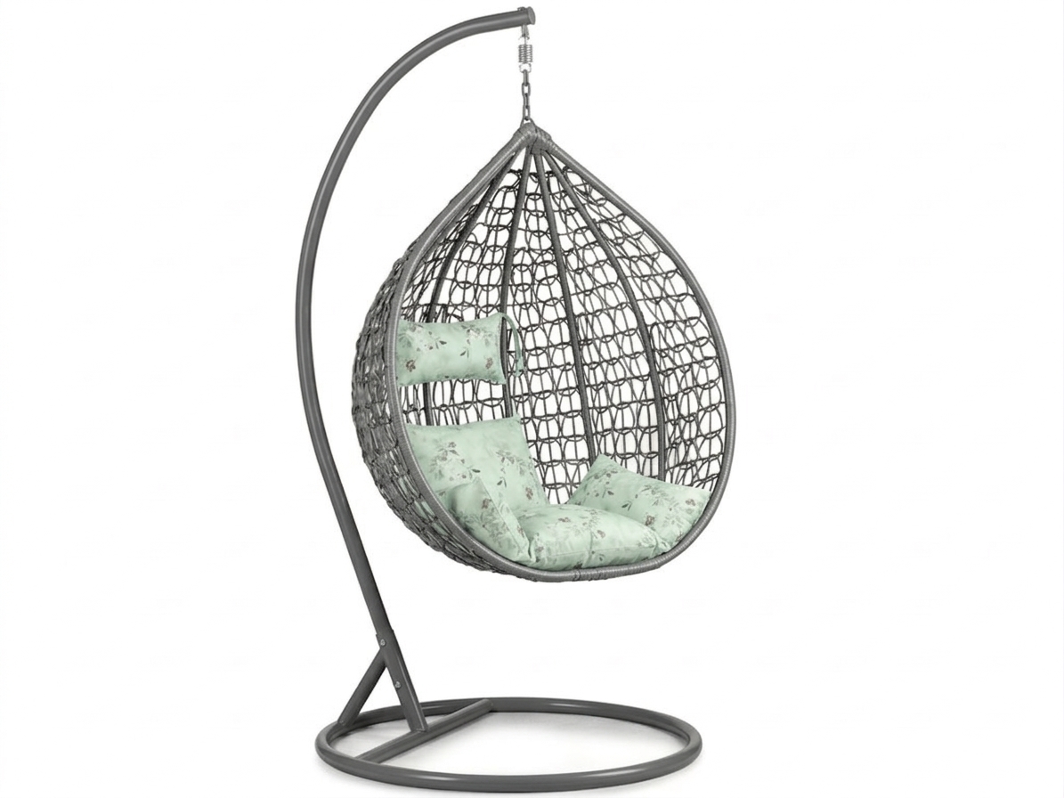 Šedé závěsné křeslo KOKON se stojanem, světle zelený polštář se vzorem